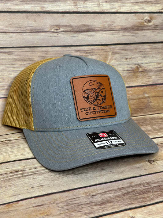 Heather Grey/Amber Gold fish & hook trucker hat