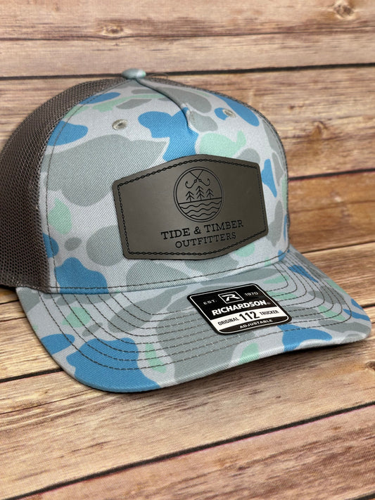 Saltwater Duck Camo/ Charcoal T&T Logo trucker hat